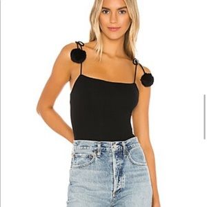 Superdown black bodysuit with Pom Pom tie traps.